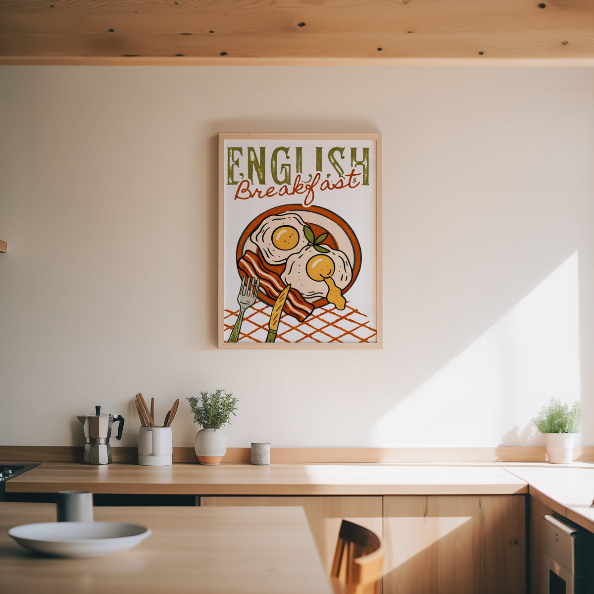 English breakfast print in an oak frame above a wood counter with a moka pot and herbs