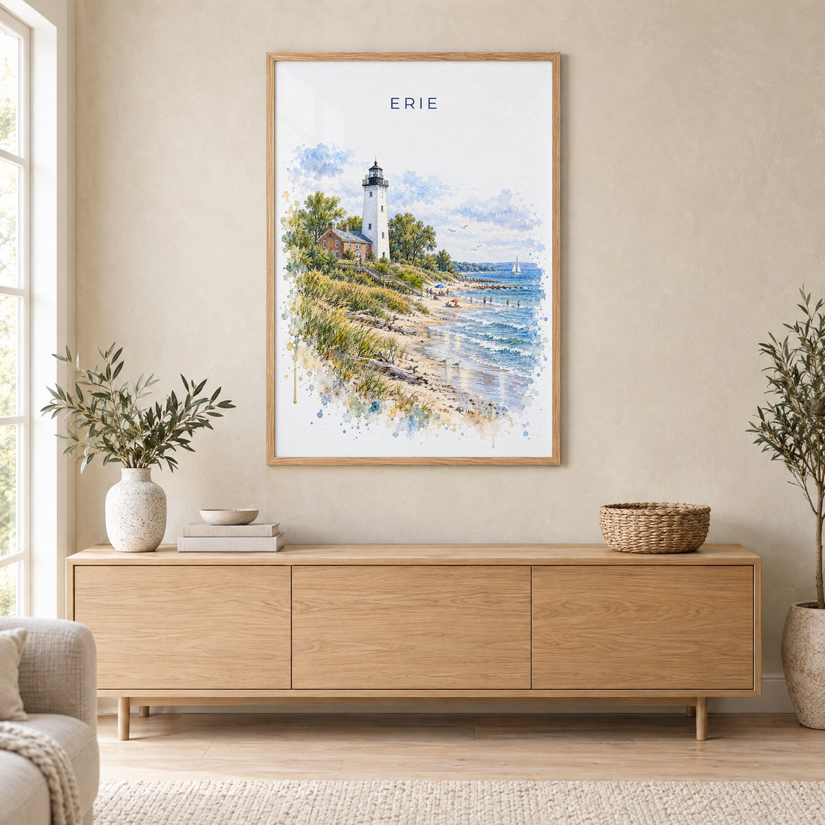 Erie, Pennsylvania watercolor print in an oak frame above a light wood sideboard in a Scandinavian living room