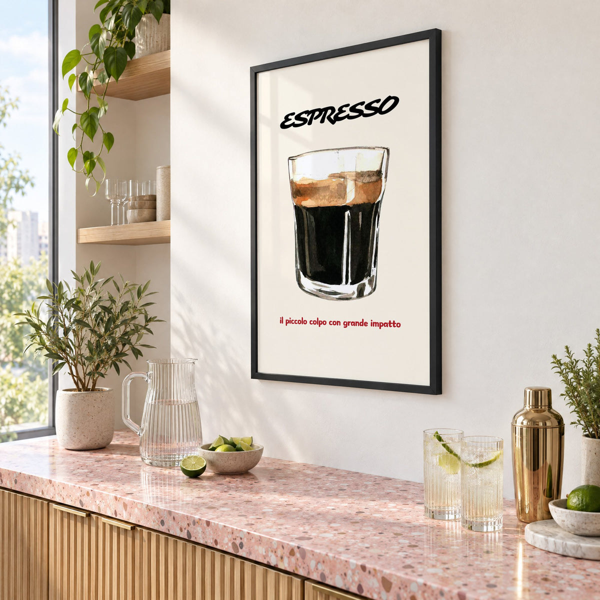 ESPRESSO watercolor glass print in a black frame above a pink terrazzo cocktail counter with limes, seen at an angle