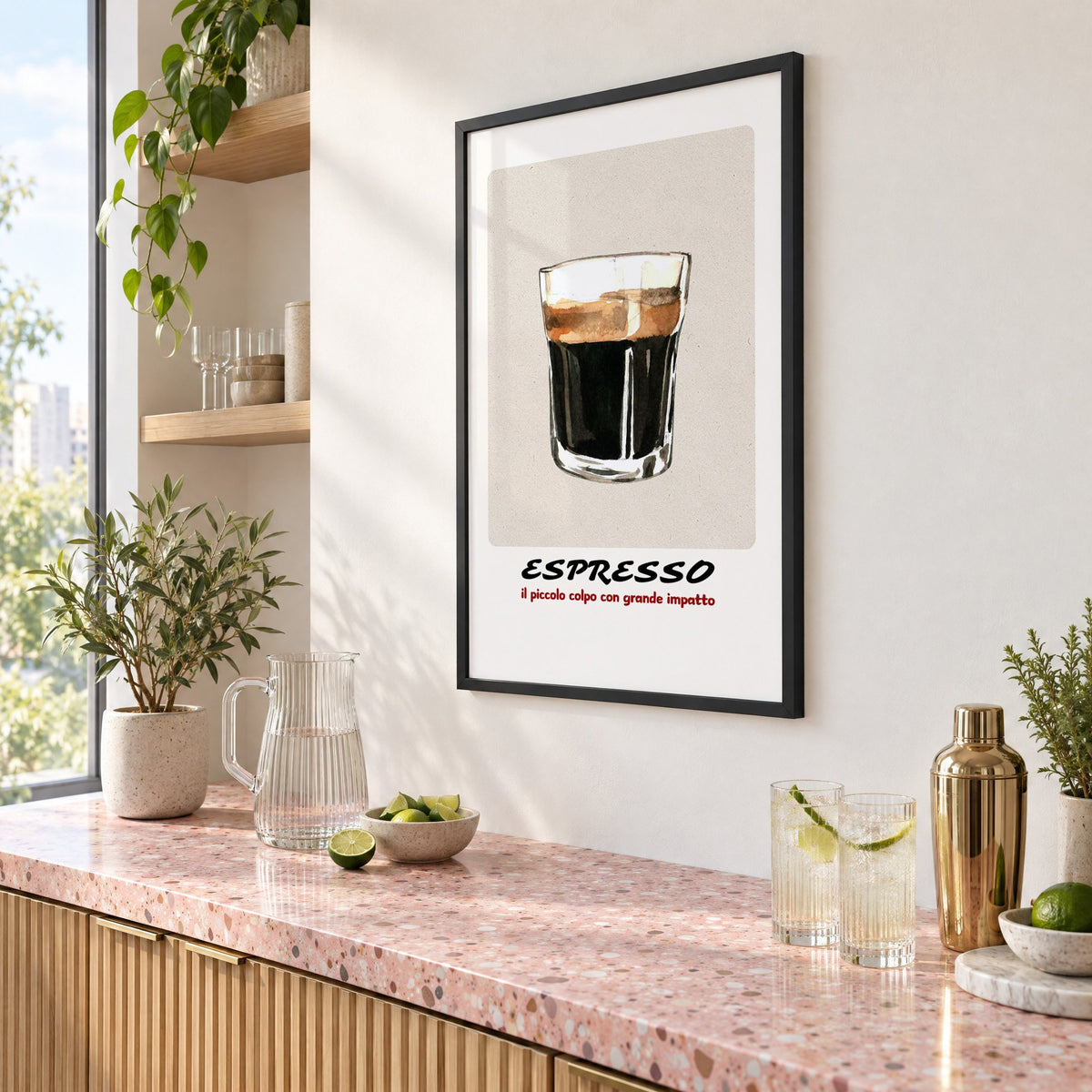 ESPRESSO watercolor glass print in a black frame above a pink terrazzo cocktail counter with limes, seen at an angle