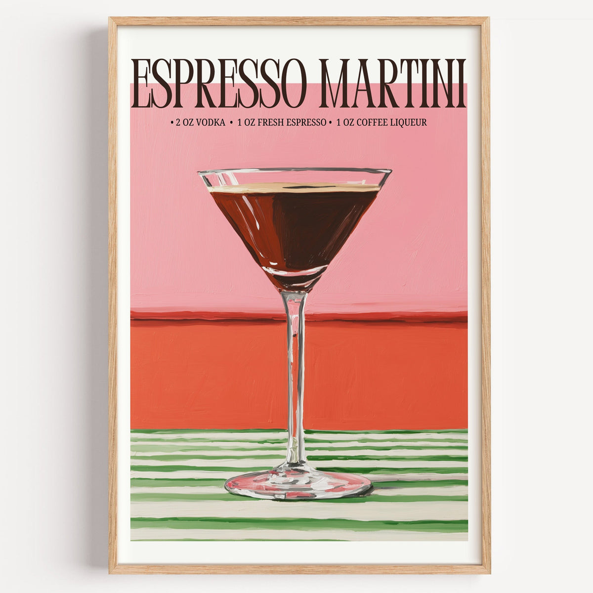 Espresso martini recipe print in a light oak frame on a plain white wall