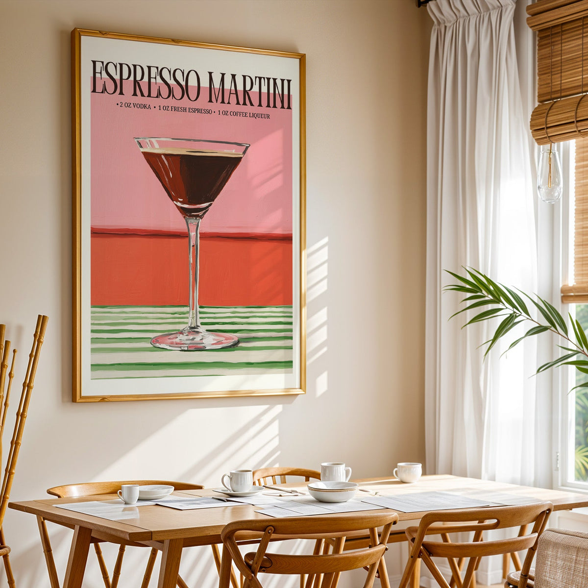 Espresso martini recipe print shown in a gold frame above a breakfast table by a curtained window