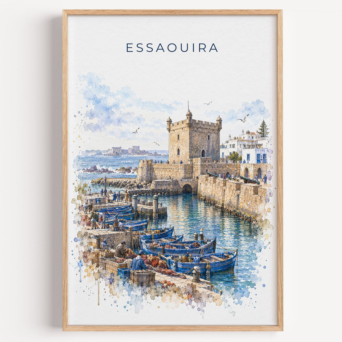 Essaouira watercolor print in a light oak frame on a plain white wall