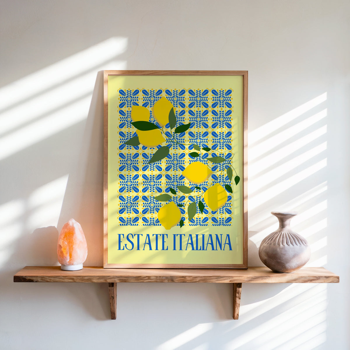 Estate Italiana lemon print in an oak frame on a live-edge shelf beside a salt lamp