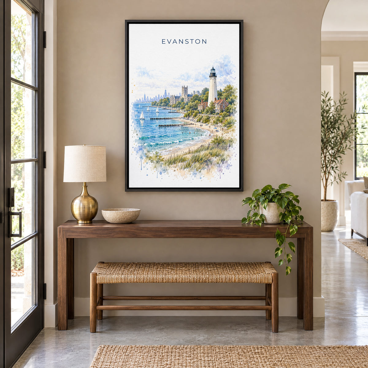 Evanston watercolor print as a black floater canvas above a walnut console and woven bench in an entryway