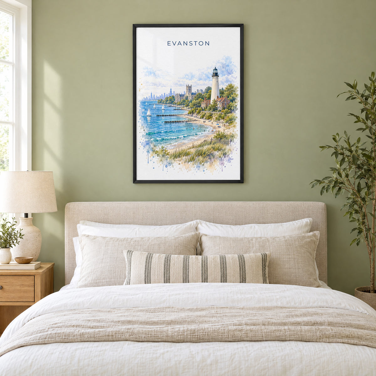 Evanston watercolor print in a black frame above an upholstered headboard in a sage green bedroom