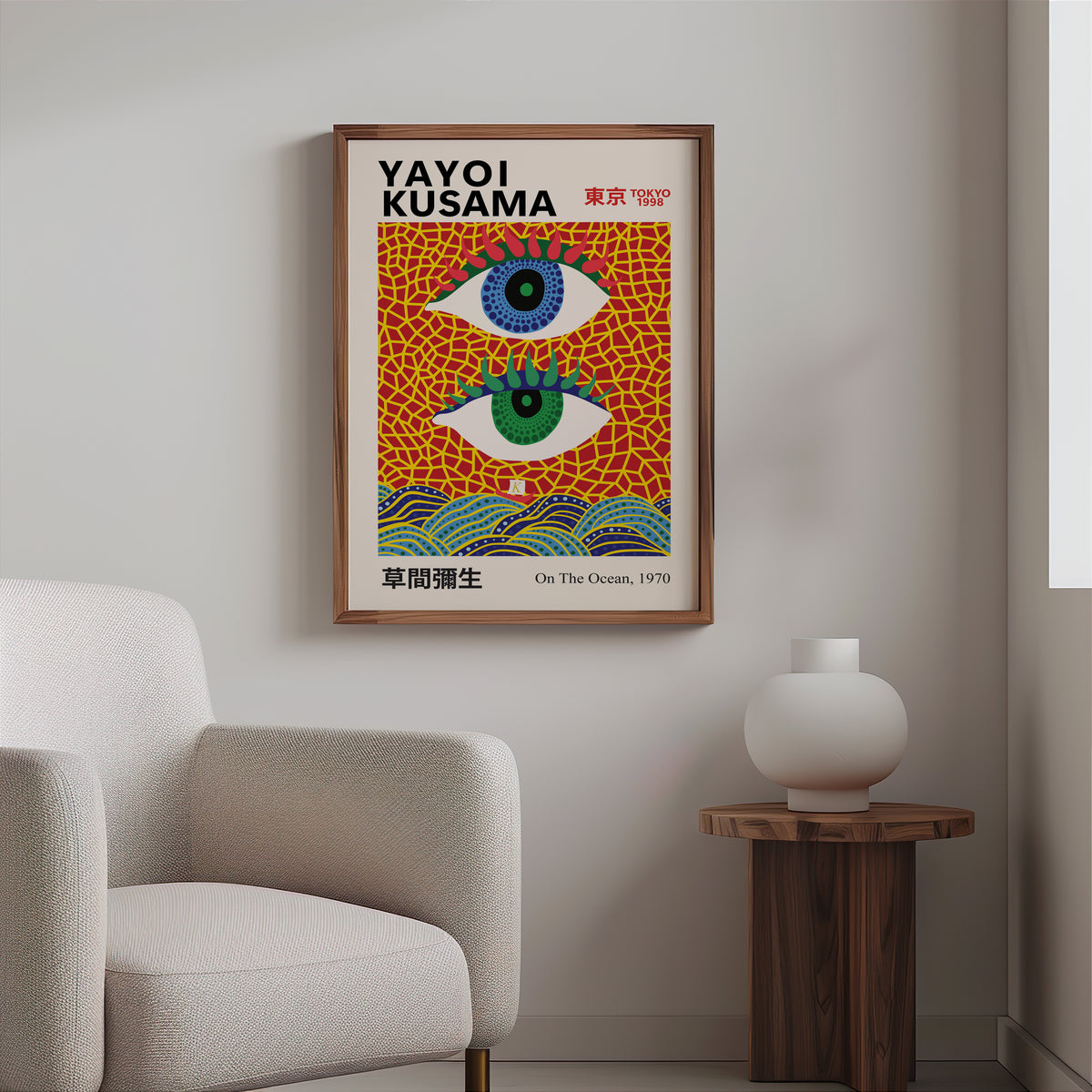 Yayoi Kusama inspired evil eyes and waves print above a cream boucle armchair