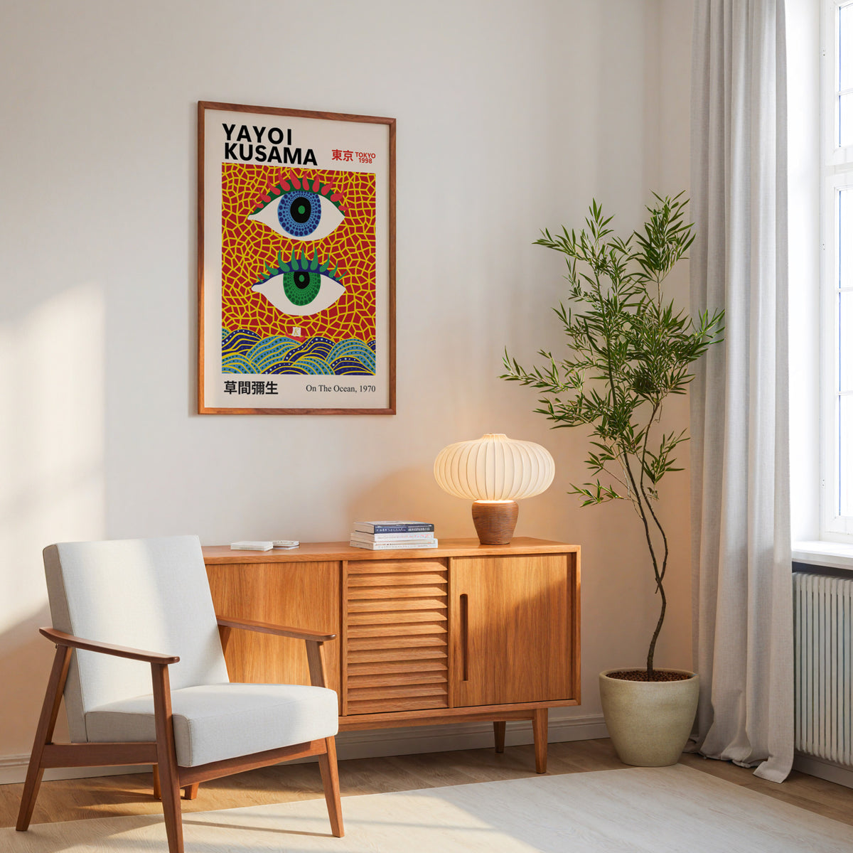 Yayoi Kusama inspired evil eyes and waves print above a mid-century sideboard