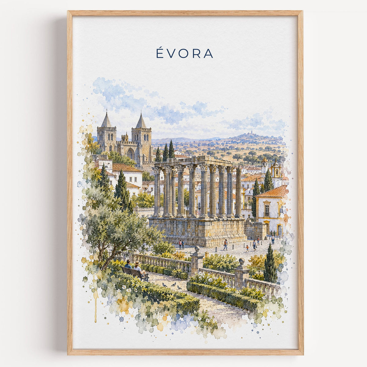 Évora watercolor print in a light oak frame on a plain white wall