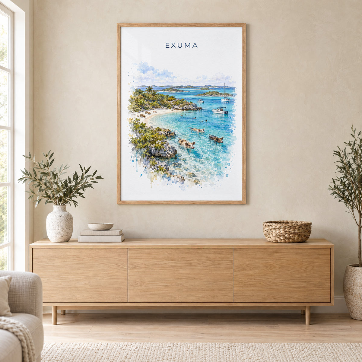 Exuma watercolor print in an oak frame above a light wood sideboard in a Scandinavian living room