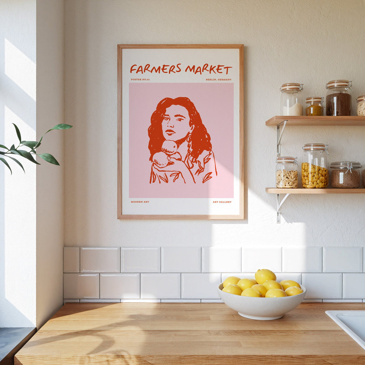 Farmers Market curly hair print in an oak frame beside open kitchen shelves