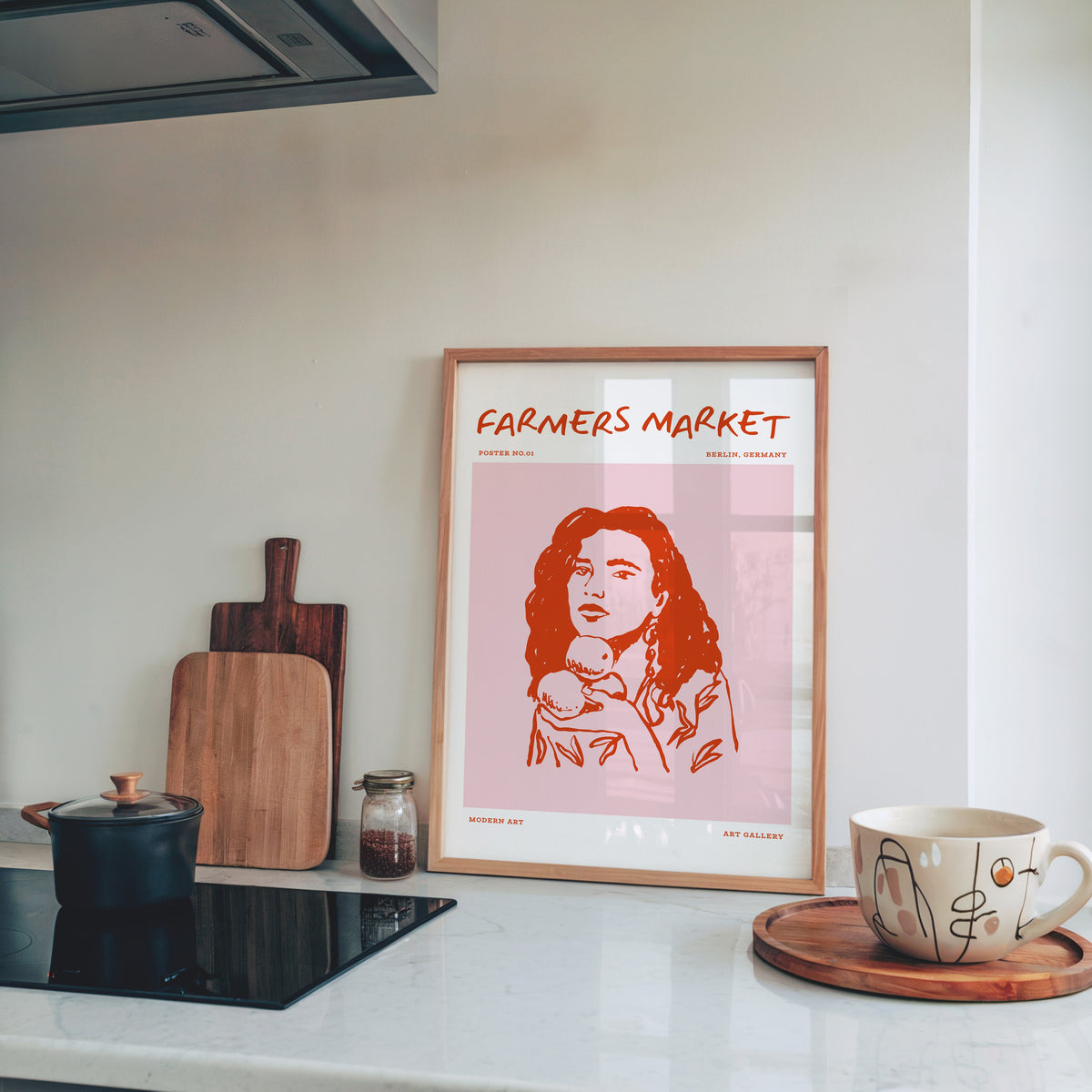 Farmers Market curly hair print in a pine frame on a marble counter