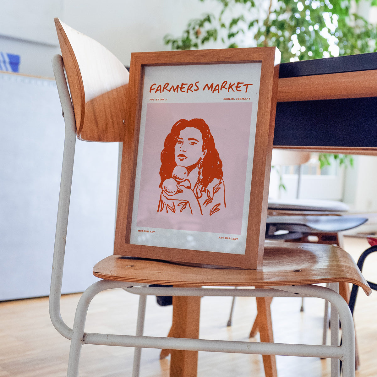 Farmers Market curly hair print in a walnut frame on a bentwood chair