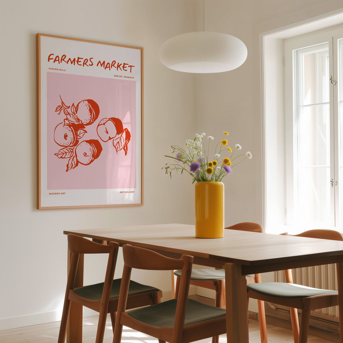 Farmers Market peaches print in a slim oak frame above a dining table under a pendant lamp