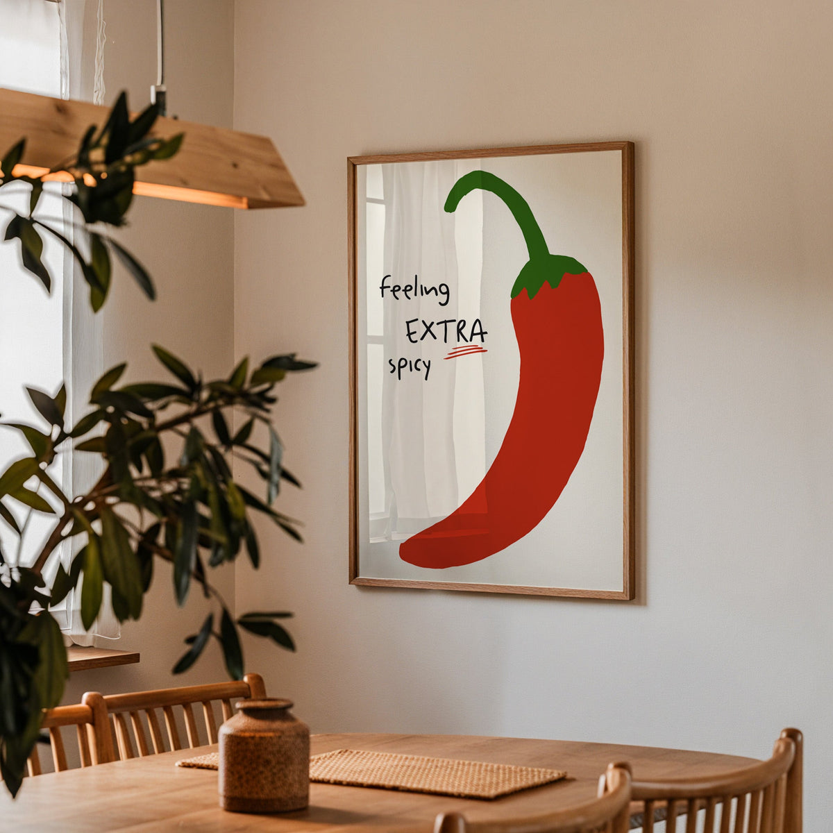 Feeling extra spicy chili print in a walnut frame above a dining table beside an olive tree
