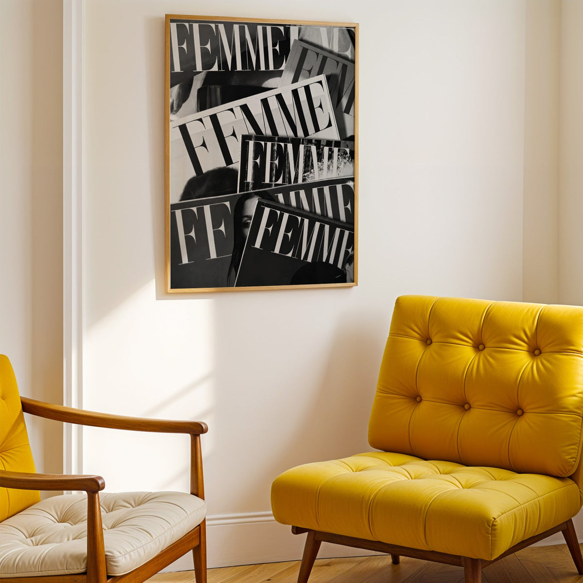 Layered FEMME magazine covers collage print shown in a gold frame above a mustard yellow tufted armchair