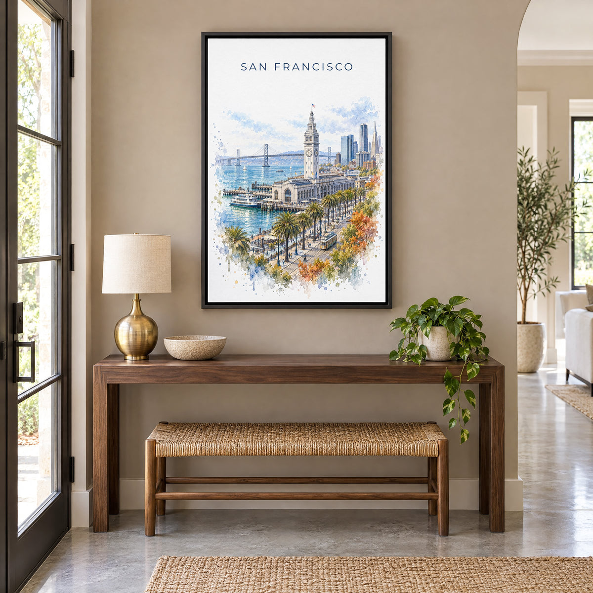Ferry Building San Francisco watercolor print as a black floater canvas above a walnut console and woven bench in an entryway