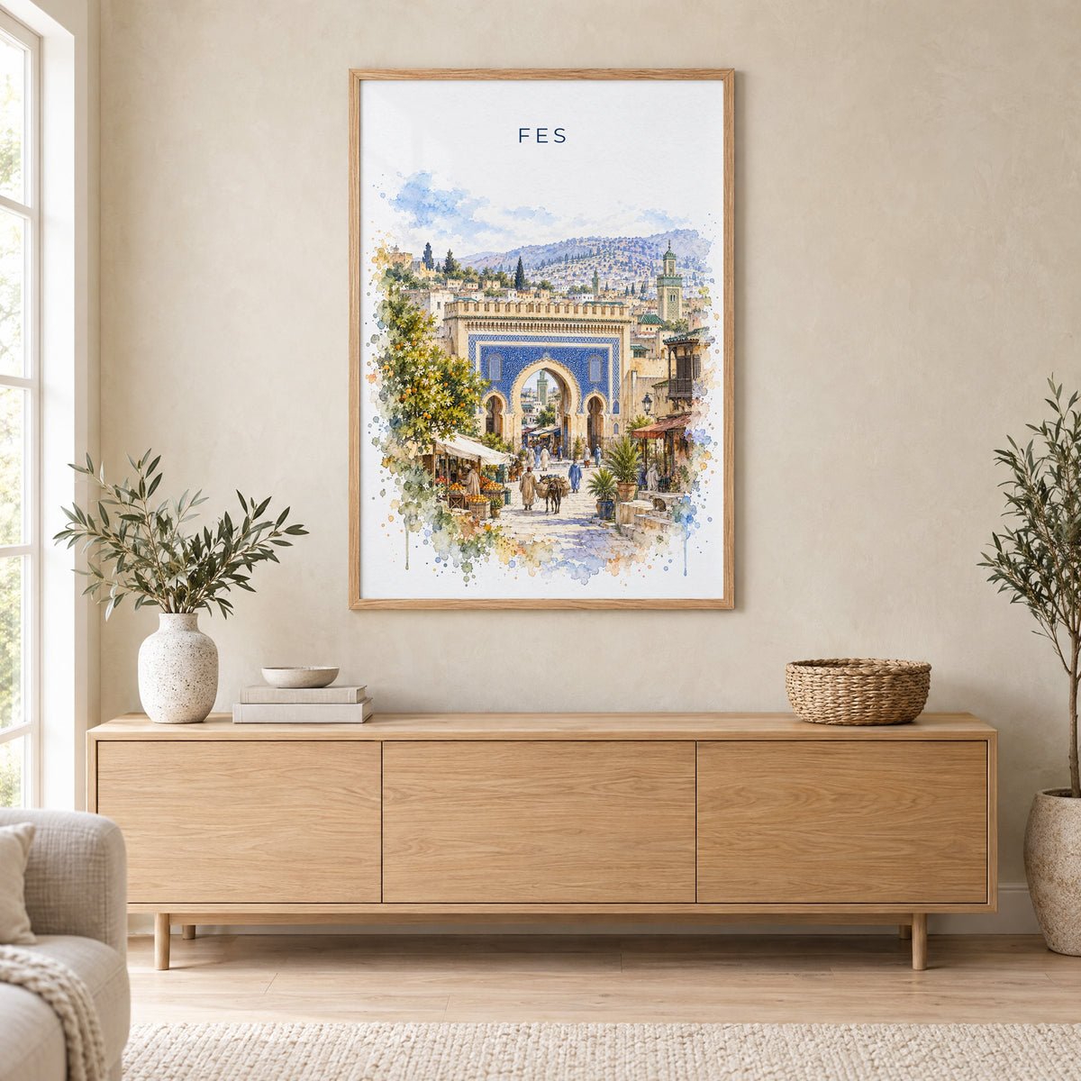 Fes, Morocco watercolor print in an oak frame above a light wood sideboard in a Scandinavian living room