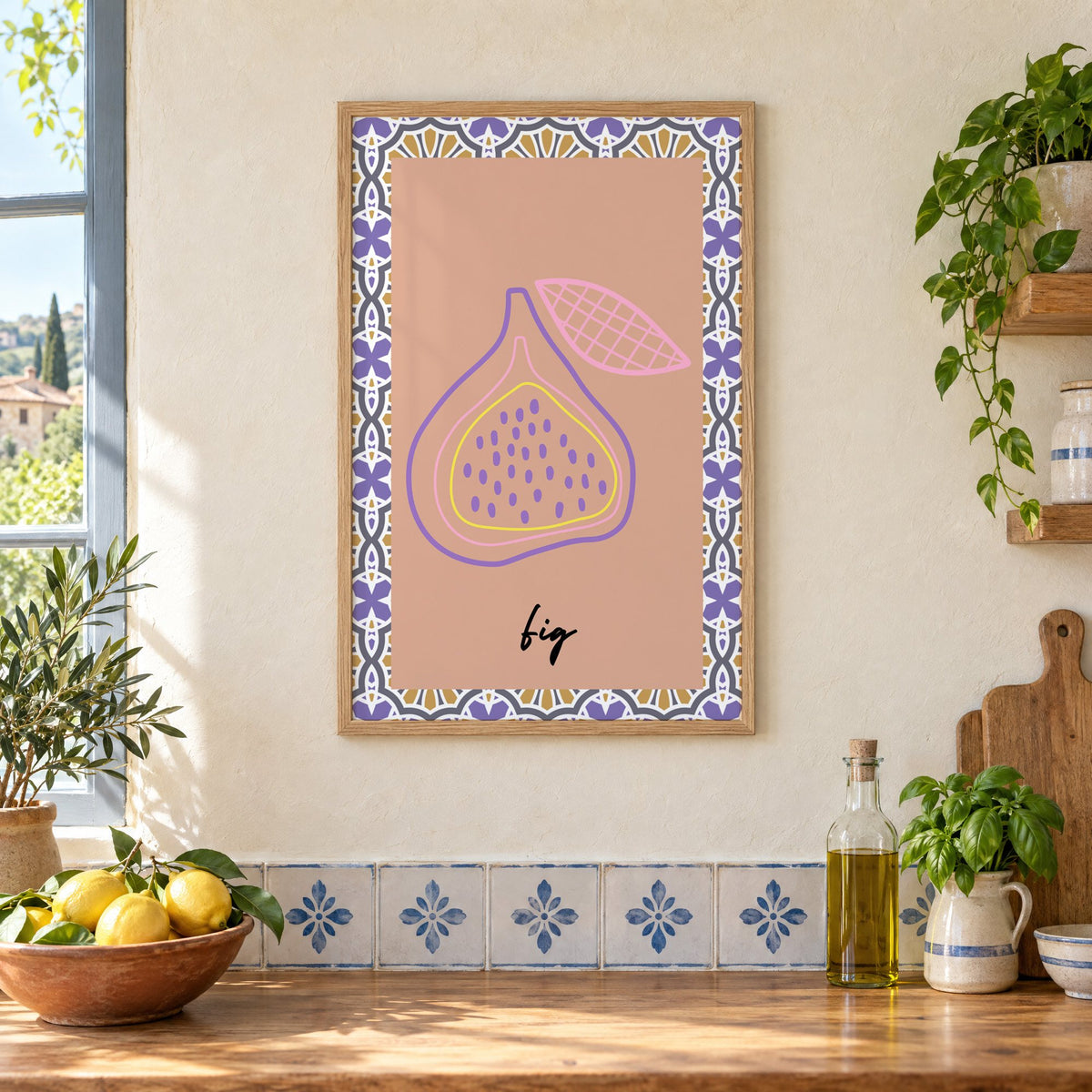 fig pastel outline purple tile print in an oak frame on a cream plaster wall above a worktop with a bowl of lemons and blue-and-white tiles