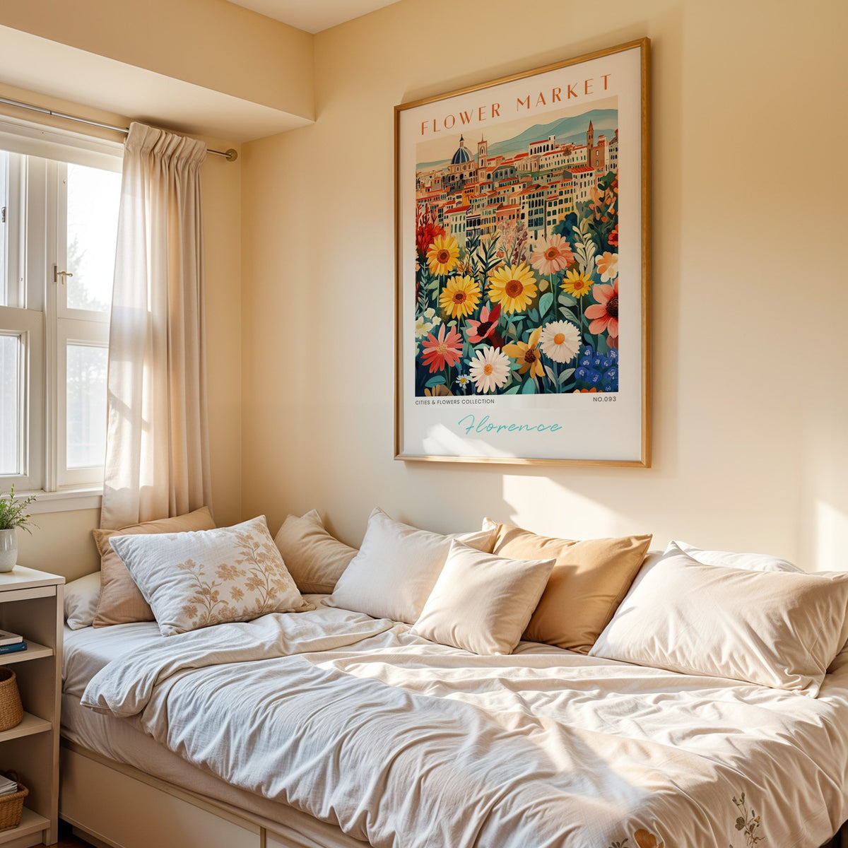 Florence flower market print in an oak frame above a cream daybed in a sunny bedroom