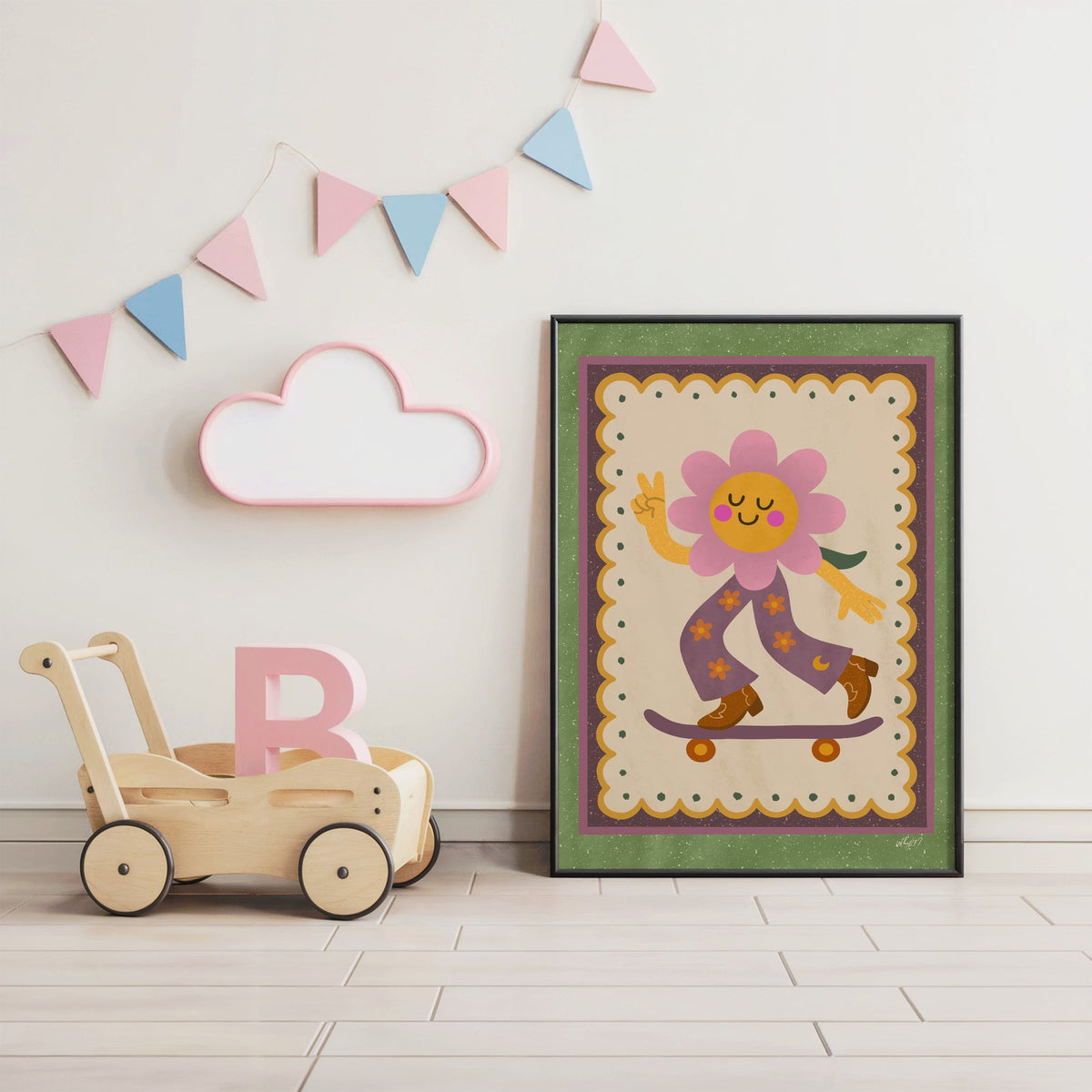 Groovy flower on skateboard nursery print in a black frame under pastel bunting by a wooden baby walker