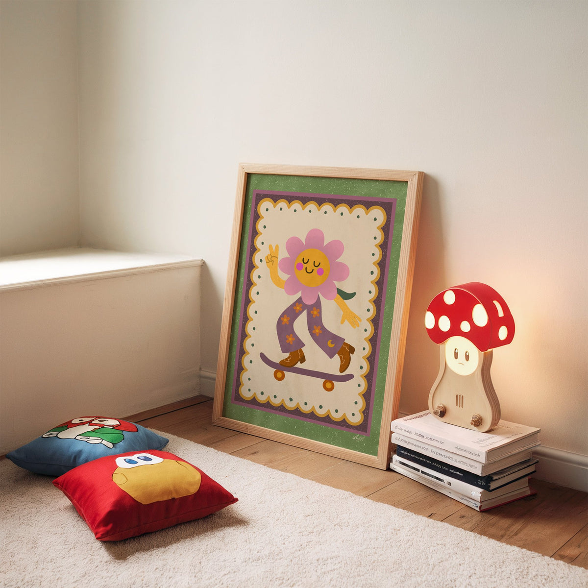 Groovy flower on skateboard nursery print in an oak frame leaning on a rug beside a mushroom lamp and floor cushions