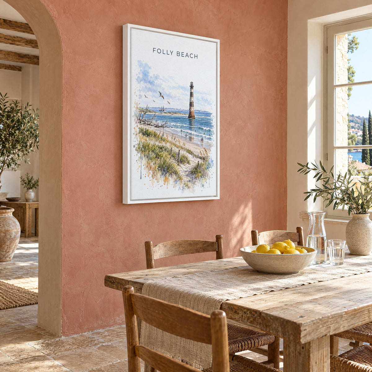 Folly Beach watercolor print as a white floater canvas on a terracotta wall above a rustic dining table
