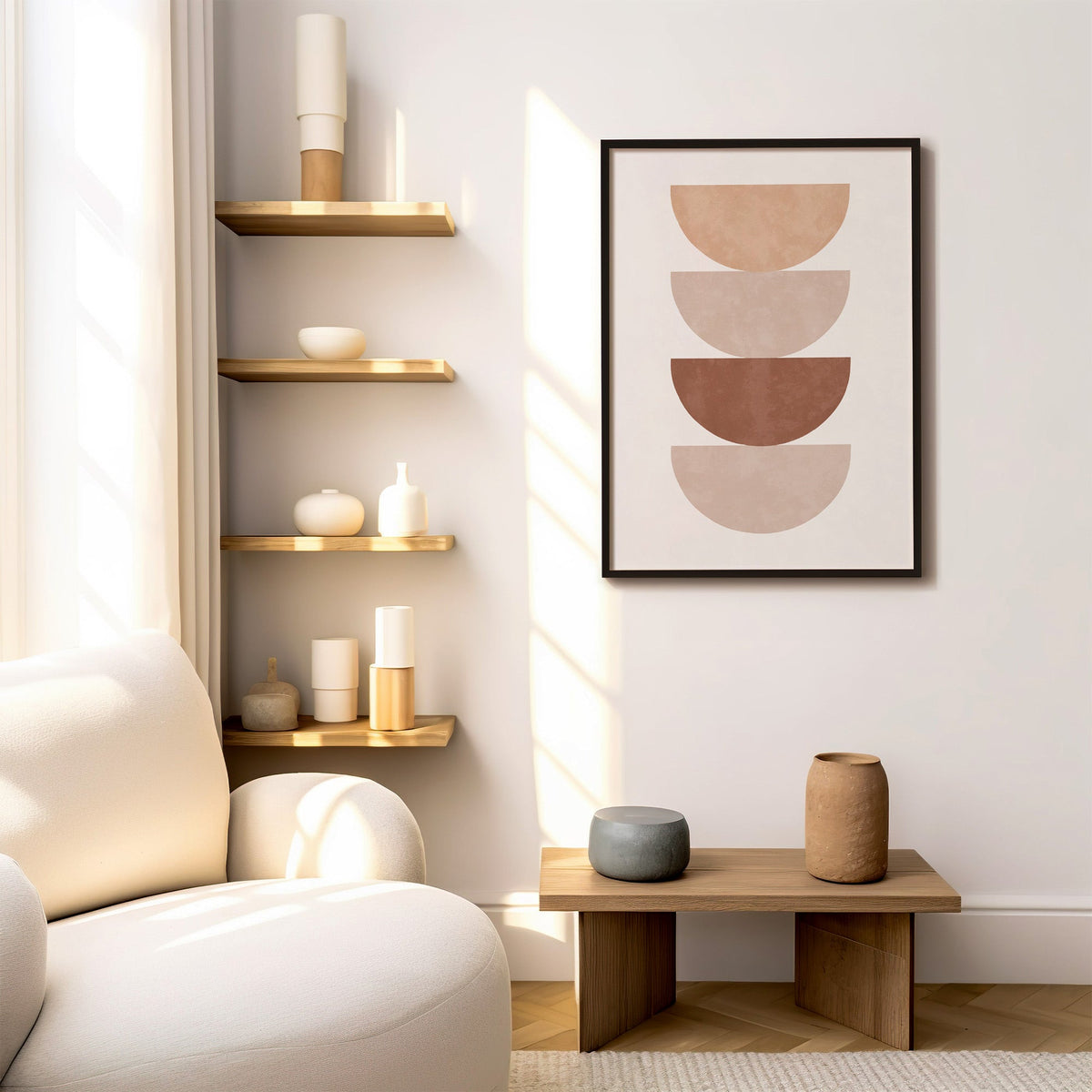 Four stacked terracotta half circles print in a black frame above a low wood bench beside floating oak shelves