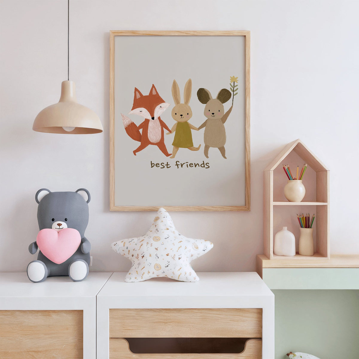 Fox bunny mouse best friends nursery print in an oak frame above a white dresser with a star pillow and house shelf