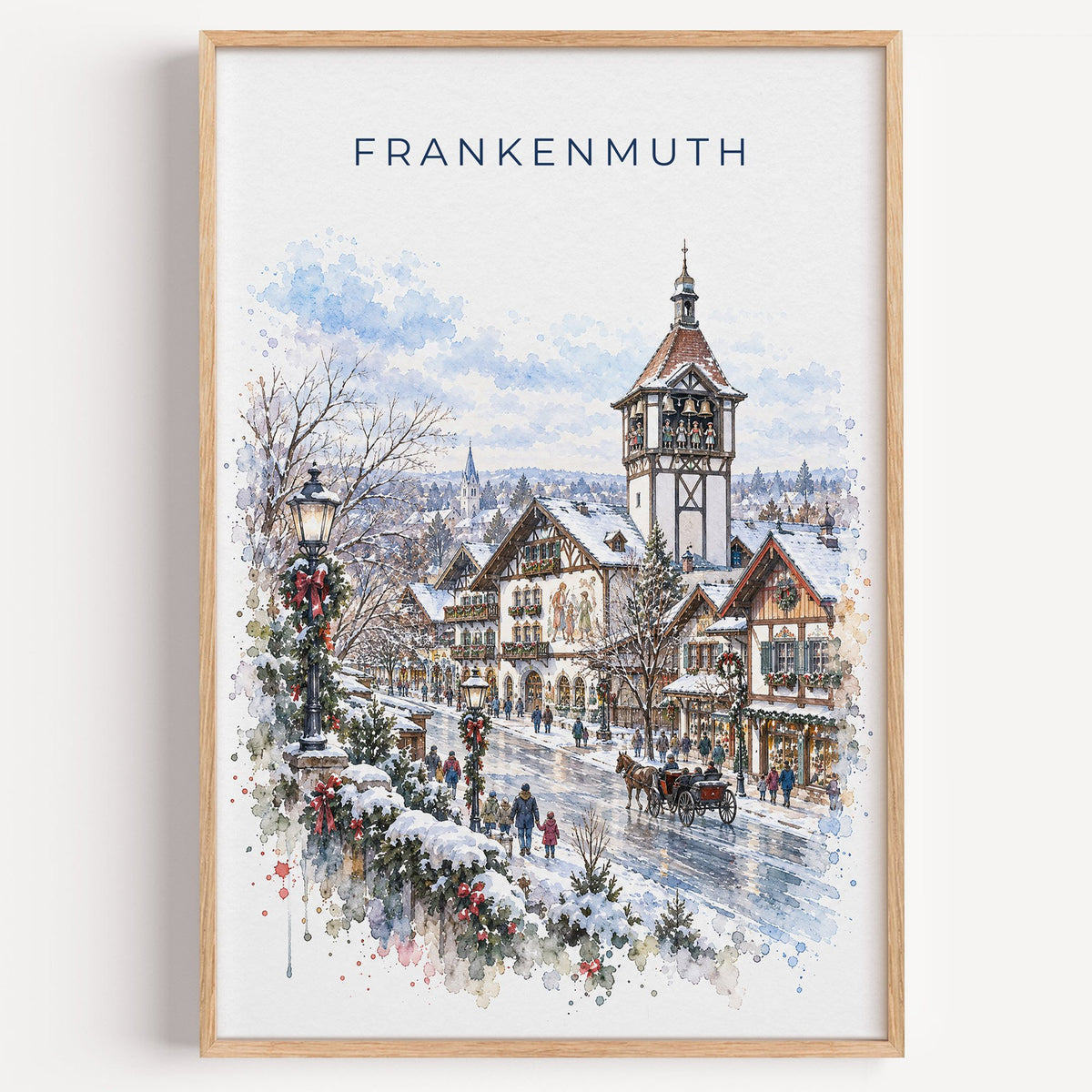 Frankenmuth watercolor print in a light oak frame on a plain white wall