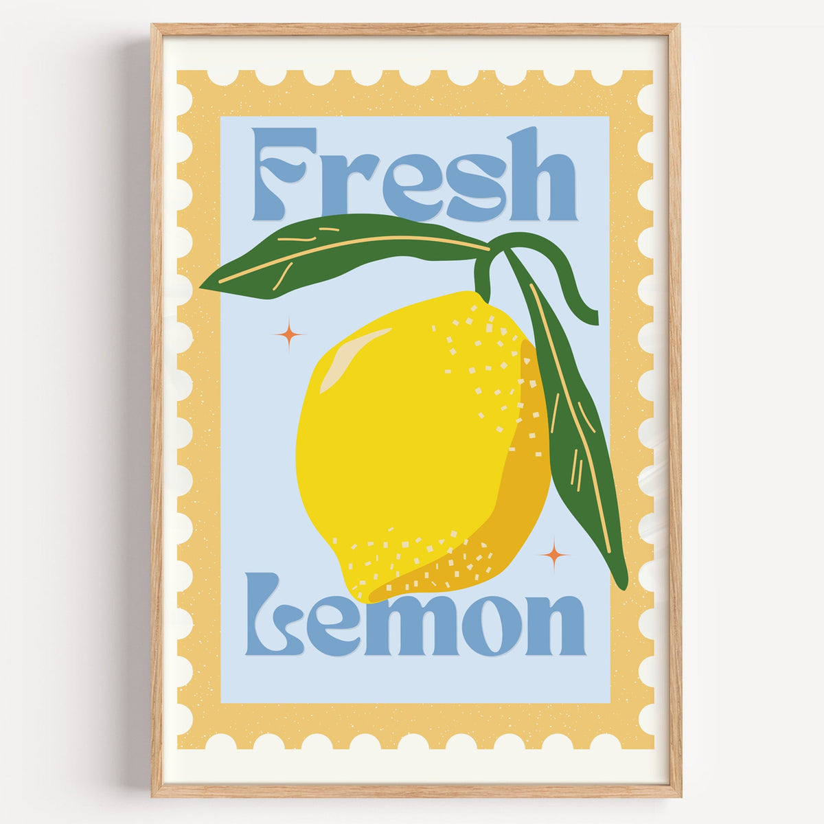 Fresh Lemon stamp print in a light oak frame on a plain white wall