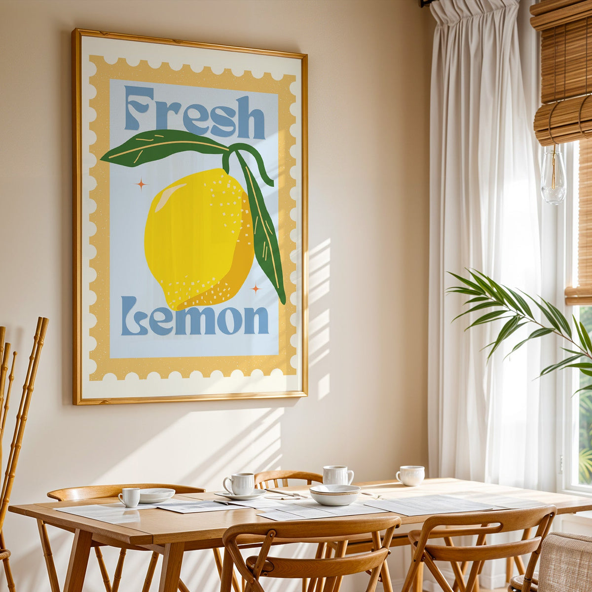 Fresh Lemon stamp print shown in a gold frame above a breakfast table by a curtained window