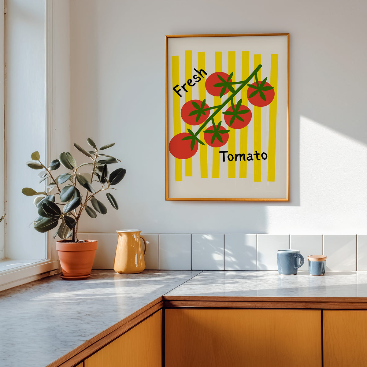 Fresh Tomato print shown in a gold frame above a marble counter in a tan kitchen