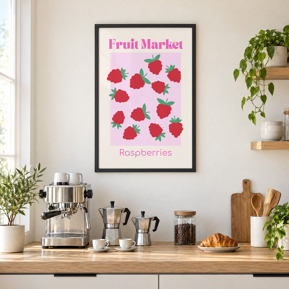 Fruit Market Raspberries pink panel print in a black frame above a home espresso bar with moka pots and espresso cups