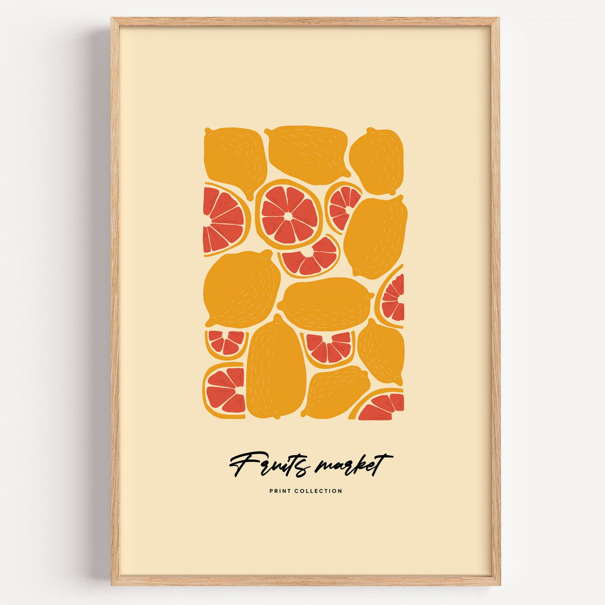 Fruits market citrus pattern print in a light oak frame on a plain white wall
