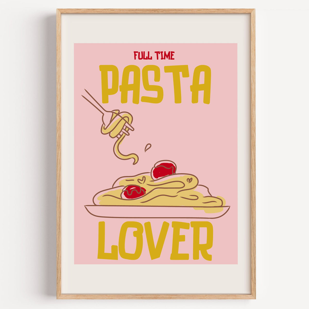 Full Time Pasta Lover spaghetti print in a light oak frame on a plain white wall
