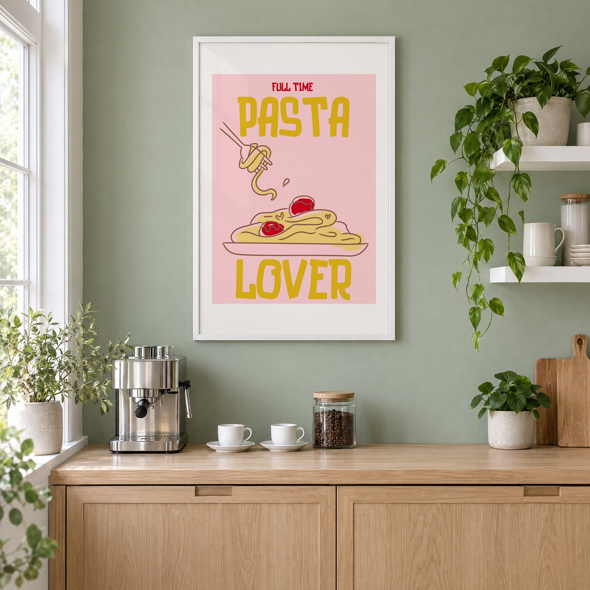 Full Time Pasta Lover spaghetti print in a white frame on a sage green coffee nook wall above an espresso machine