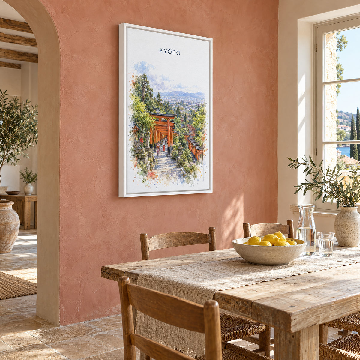 Fushimi Inari Shrine watercolor print as a white floater canvas on a terracotta wall above a rustic dining table