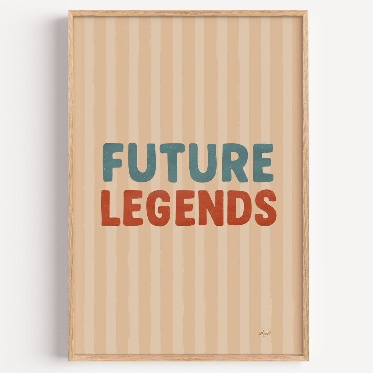 Future legends retro lettering nursery print in a light oak frame on a plain white wall