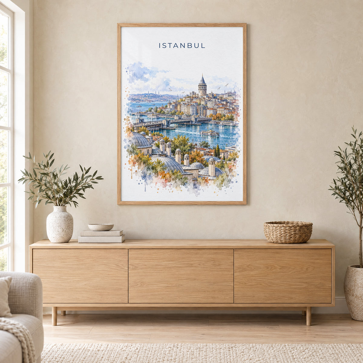 Galata Tower watercolor print in an oak frame above a light wood sideboard in a Scandinavian living room