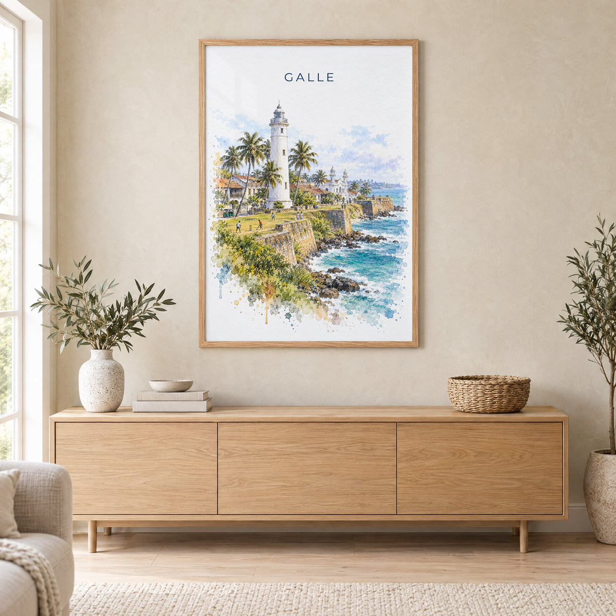 Galle, Sri Lanka watercolor print in an oak frame above a light wood sideboard in a Scandinavian living room