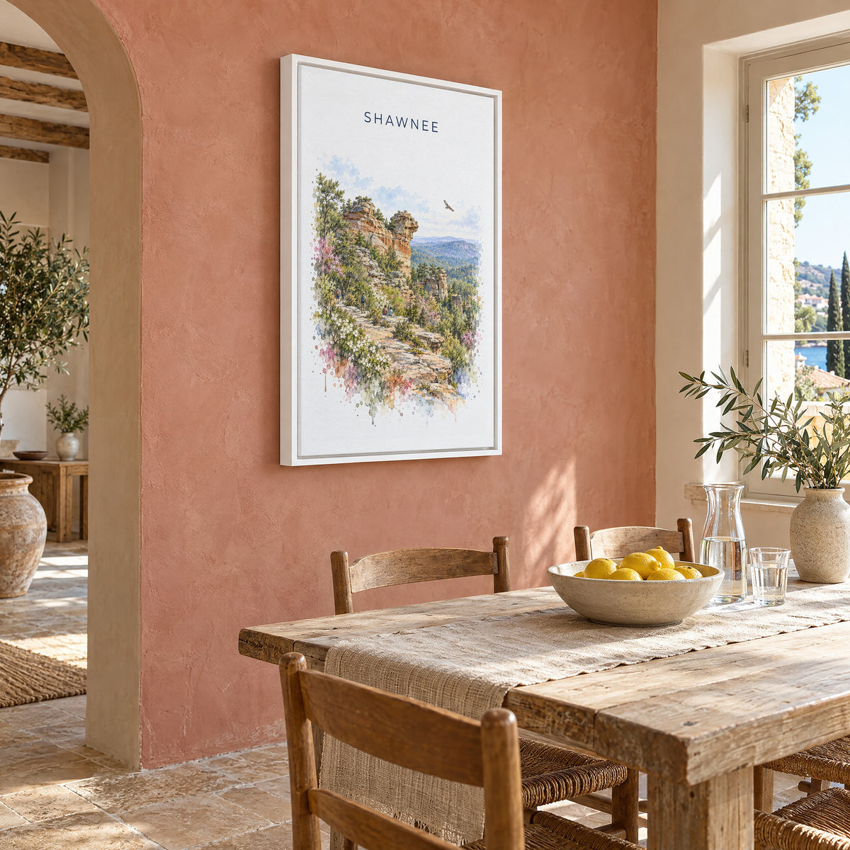 Garden of the Gods, Illinois watercolor print as a white floater canvas on a terracotta wall above a rustic dining table