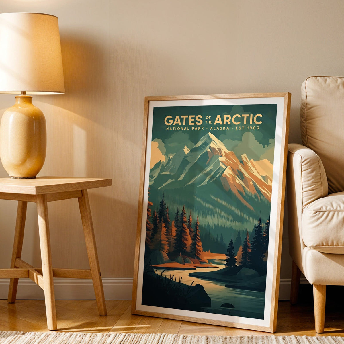 Gates of the Arctic print in an oak frame beside a cream armchair and an amber lamp