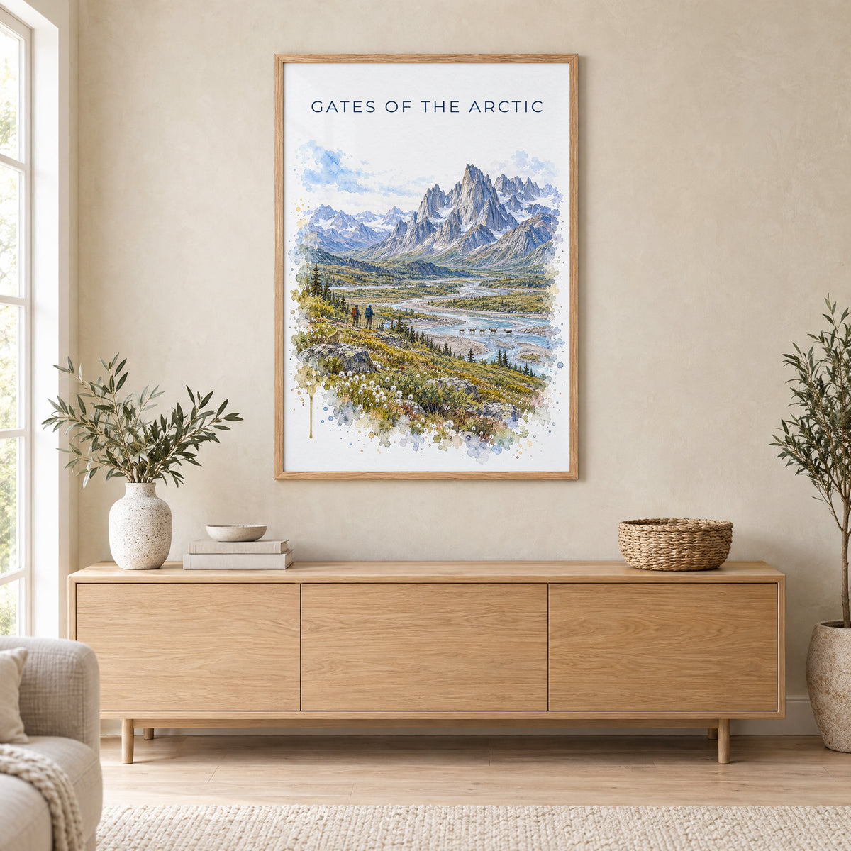 Gates of the Arctic National Park watercolor print in an oak frame above a light wood sideboard in a Scandinavian living room