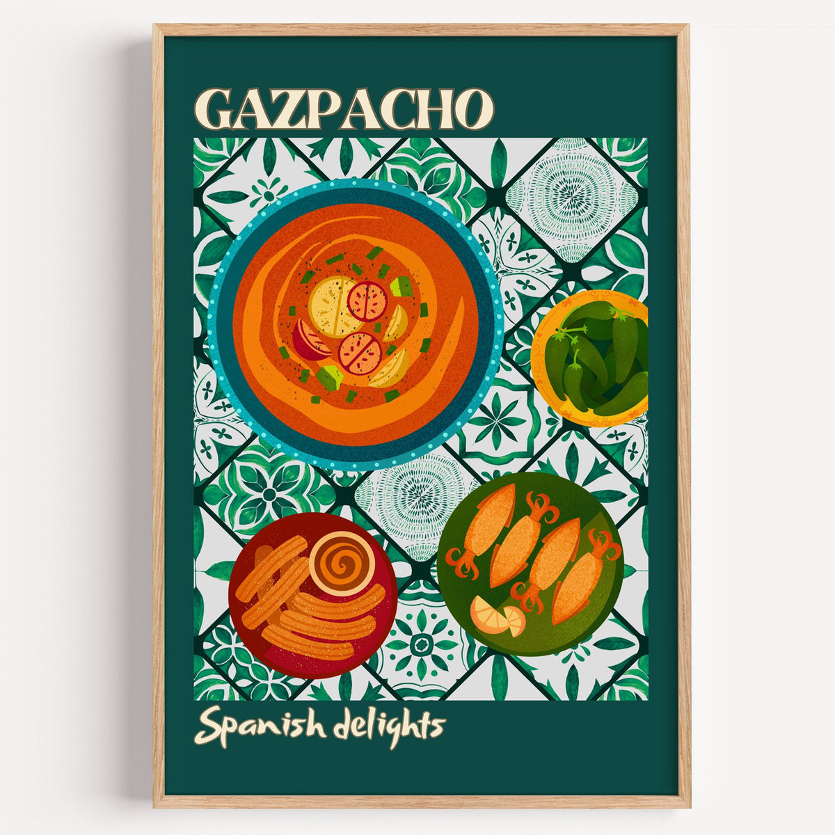 Gazpacho tapas print with teal border in a light oak frame on a plain white wall