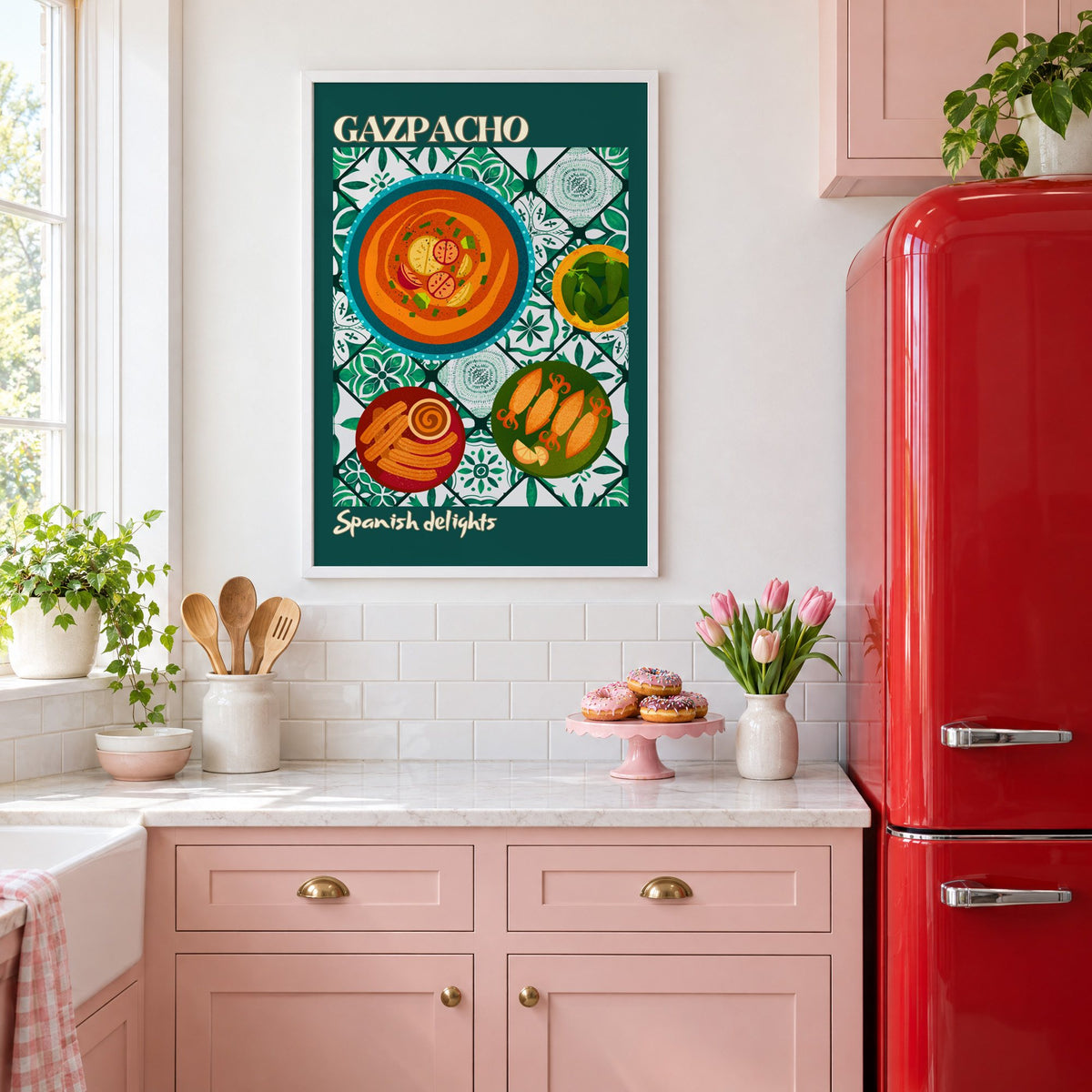 Gazpacho tapas print with teal border in a white frame in a pink kitchen beside a red retro fridge