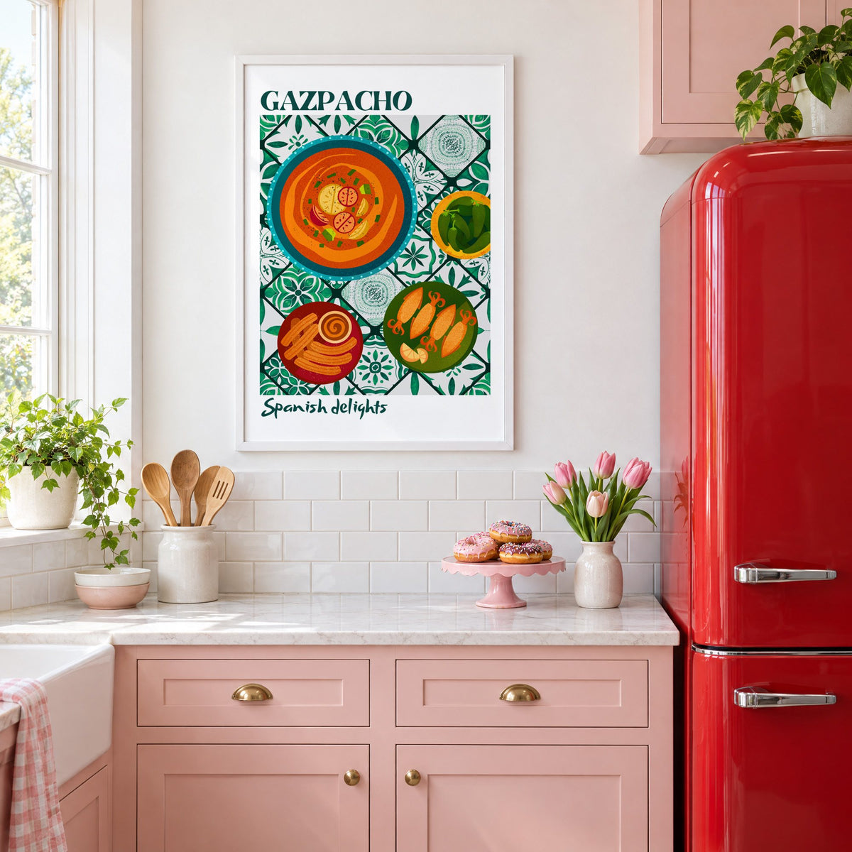 Gazpacho tapas print with white border in a white frame in a pink kitchen beside a red retro fridge