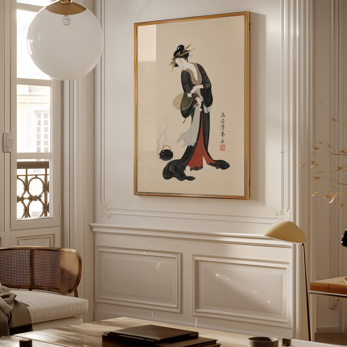 woman in black kimono with fan print shown in a gold frame on a paneled wall in a Parisian-style living room