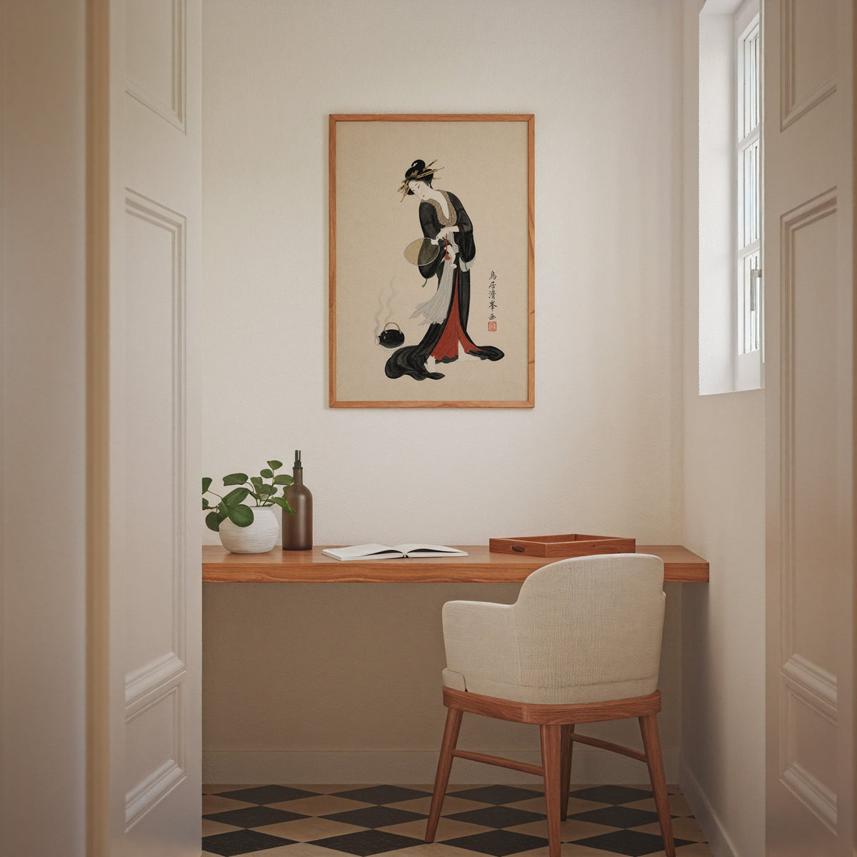 woman in black kimono with fan print in an oak frame above a wall-mounted desk in a home office nook
