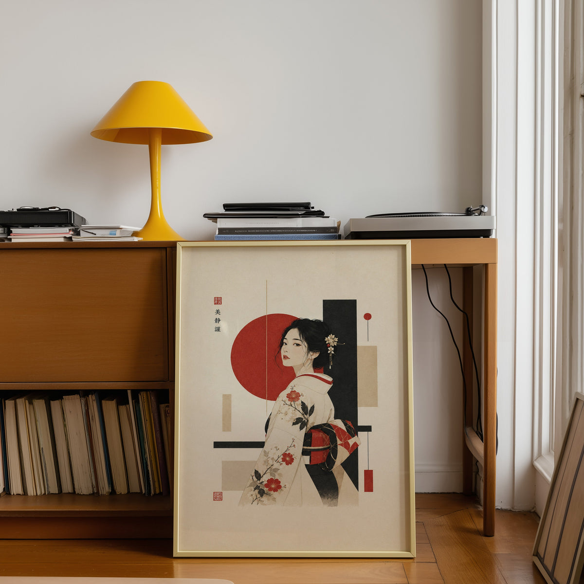 kimono woman with red circle print shown in a gold frame leaning under a teak desk with a yellow lamp